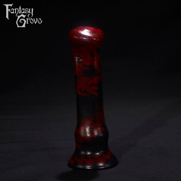 A Fantasy Grove sex toy on a black background with a logo in the upper left corner