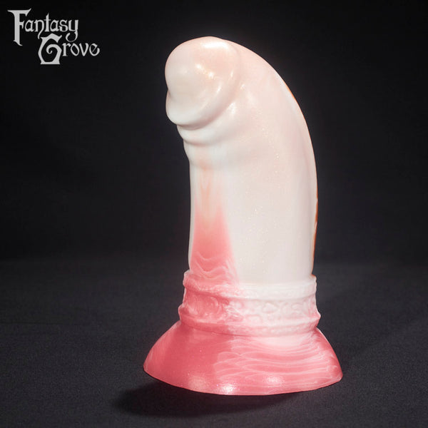 A fantasy sex toy on a black background with the Fantasy Grove logo in the upper left corner 