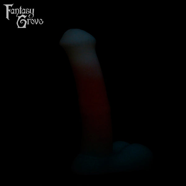 A fantasy sex toys on a black background with Fantasy Grove branding