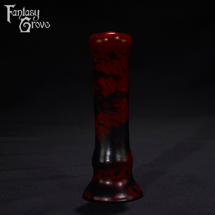 A Fantasy Grove sex toy on a black background with a logo in the upper left corner