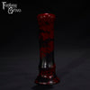 A Fantasy Grove sex toy on a black background with a logo in the upper left corner
