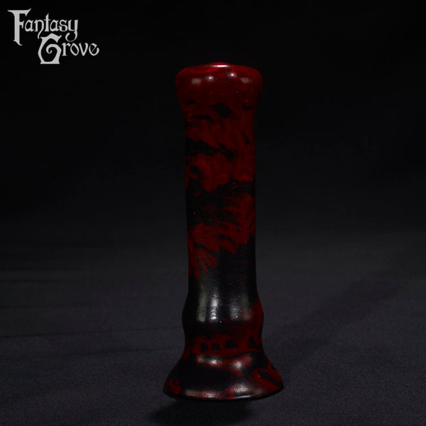 A Fantasy Grove sex toy on a black background with a logo in the upper left corner