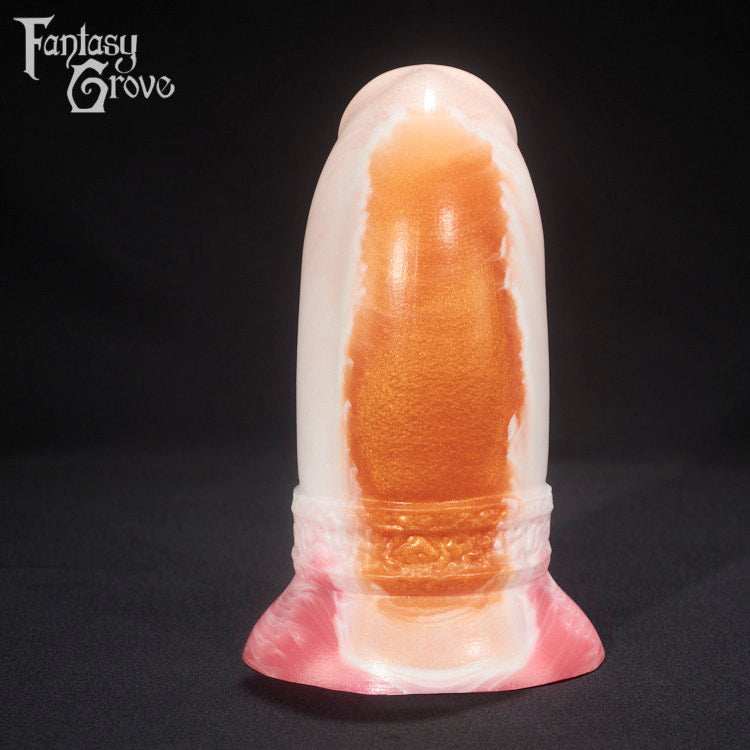 A fantasy sex toy on a black background with the Fantasy Grove logo in the upper left corner 