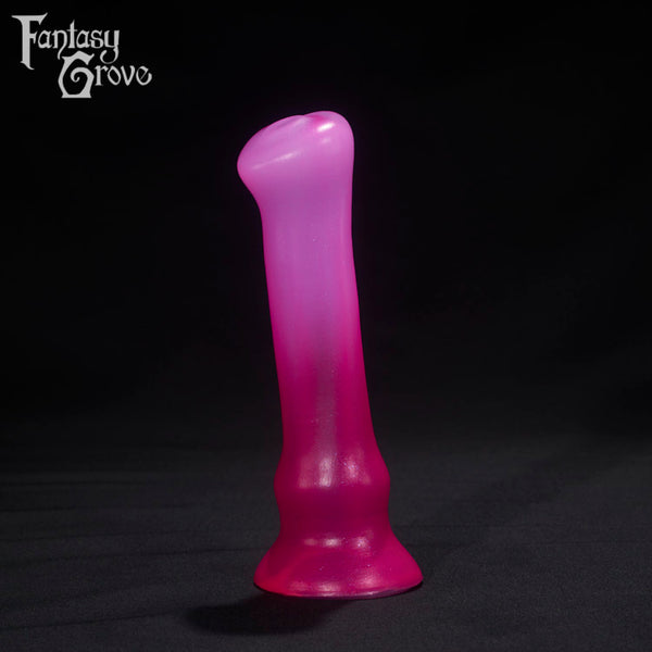 A Fantasy Grove sex toy on a black background with a logo in the upper left corner