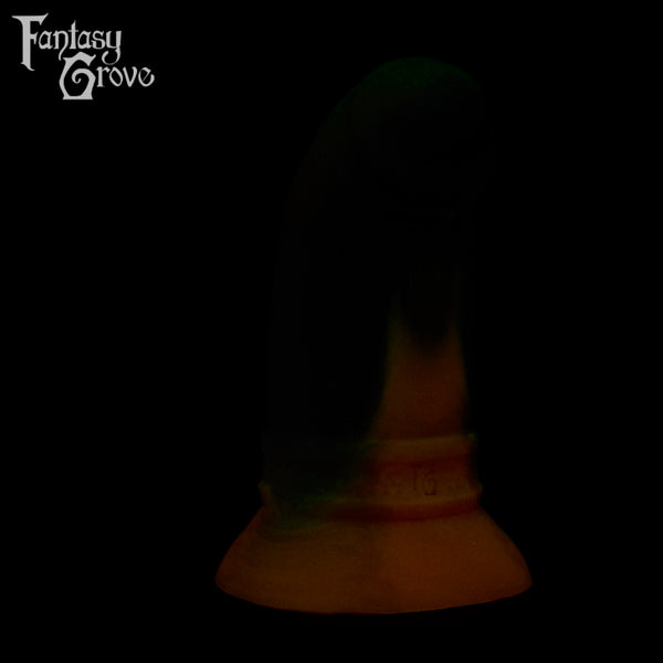 A fantasy sex toy on a black background with the Fantasy Grove logo in the upper left corner 