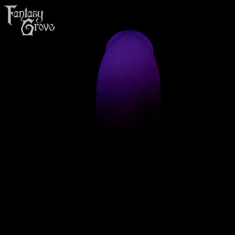 A fantasy sex toy on a black background with the Fantasy Grove logo in the upper left corner