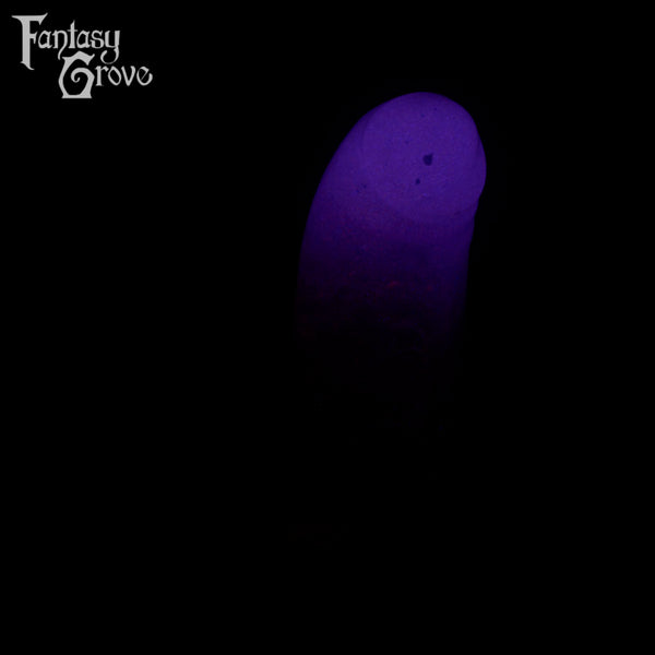 A fantasy sex toy on a black background with the Fantasy Grove logo in the upper left corner