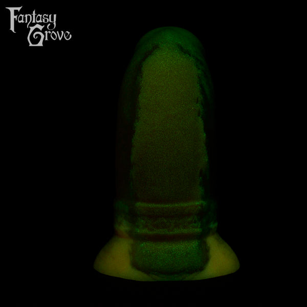 A fantasy sex toy on a black background with the Fantasy Grove logo in the upper left corner 