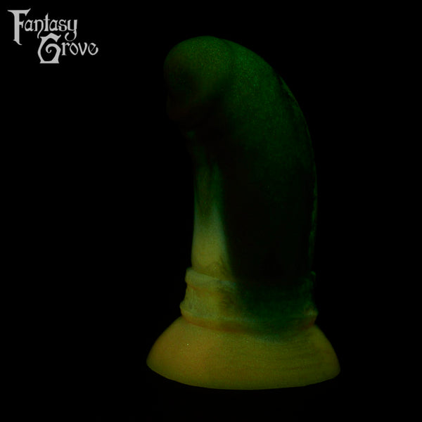 A fantasy sex toy on a black background with the Fantasy Grove logo in the upper left corner 
