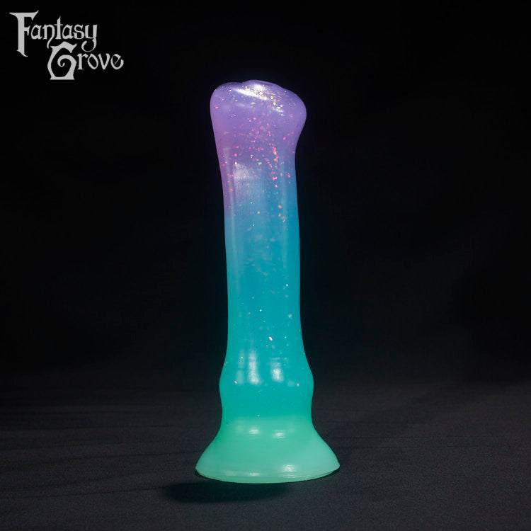 A Fantasy Grove sex toy on a black background with a logo in the upper left corner