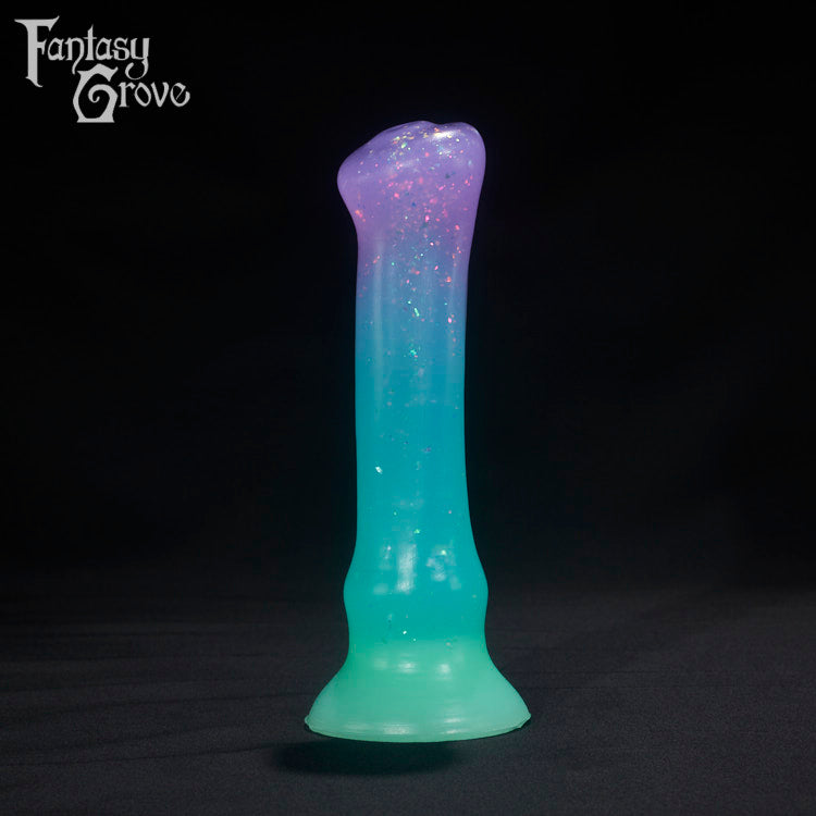 A Fantasy Grove sex toy on a black background with a logo in the upper left corner