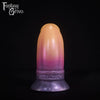 A fantasy sex toy on a black background with the Fantasy Grove logo in the upper left corner