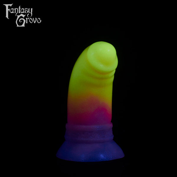A fantasy sex toy on a black background with the Fantasy Grove logo in the upper left corner