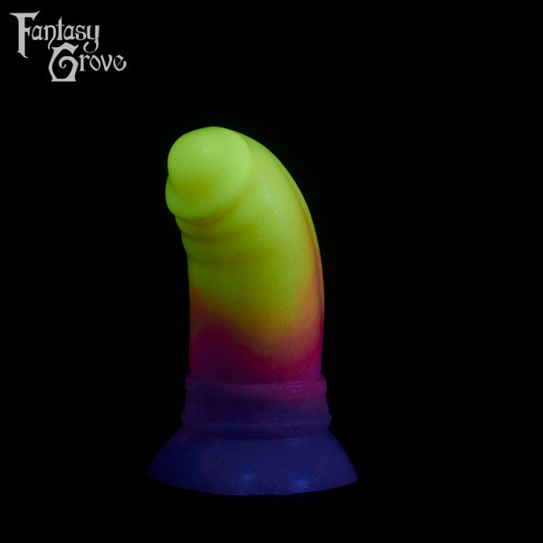 A fantasy sex toy on a black background with the Fantasy Grove logo in the upper left corner
