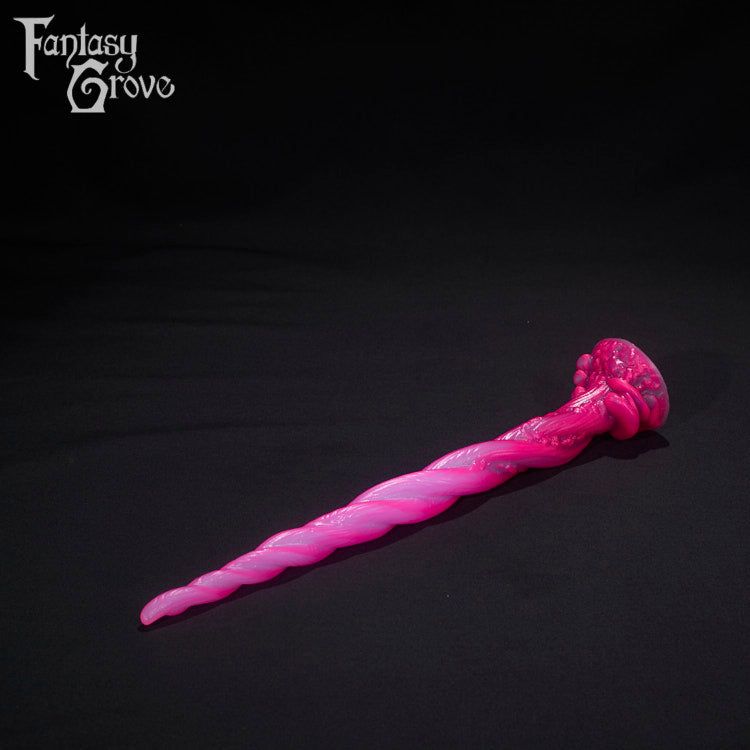 A Fantasy Grove sex toy on a black background with a logo in the upper left corner