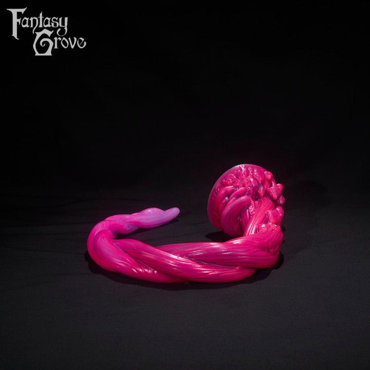 A Fantasy Grove sex toy on a black background with a logo in the upper left corner