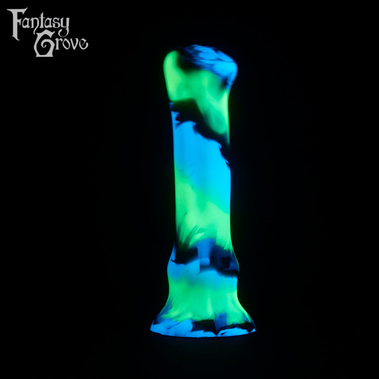 A fantasy sex toy on a black background with the Fantasy Grove logo in the upper left corner