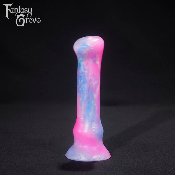 A fantasy sex toy on a black background with the Fantasy Grove logo in the upper left corner 