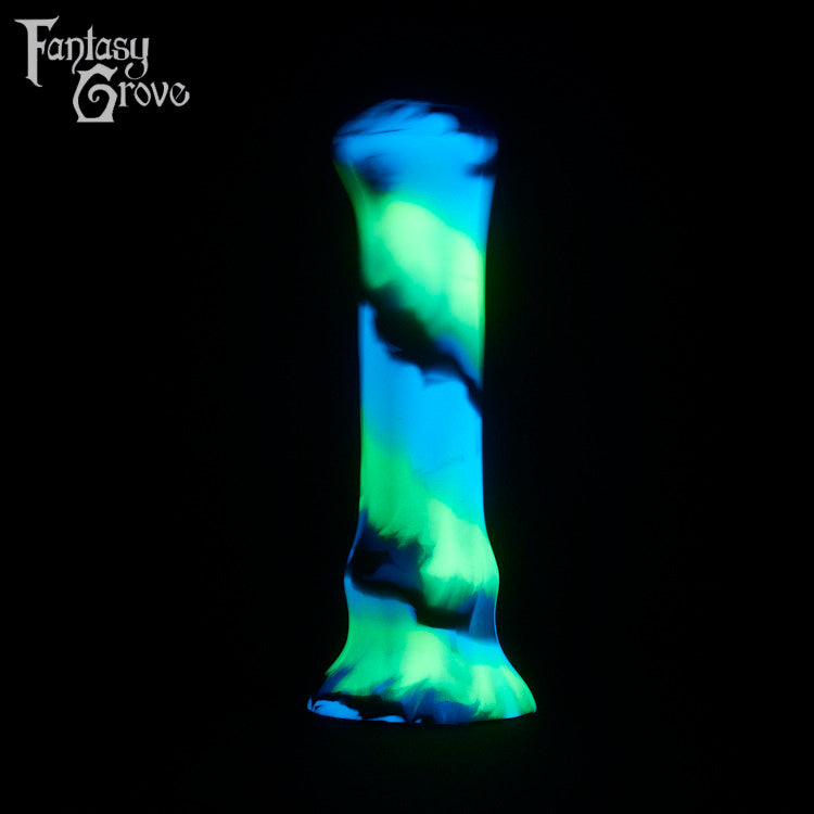 A fantasy sex toy on a black background with the Fantasy Grove logo in the upper left corner