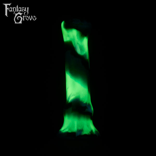 A fantasy sex toy on a black background with the Fantasy Grove logo in the upper left corner