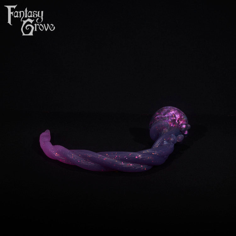A fantasy sex toy on a black background with the Fantasy Grove logo in the upper left corner