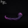 A fantasy sex toy on a black background with the Fantasy Grove logo in the upper left corner