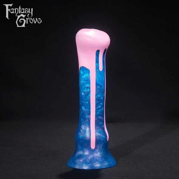 A fantasy sex toy on a black background with the Fantasy Grove logo in the upper left corner 