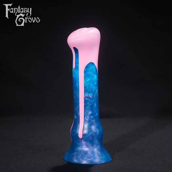 A fantasy sex toy on a black background with the Fantasy Grove logo in the upper left corner 