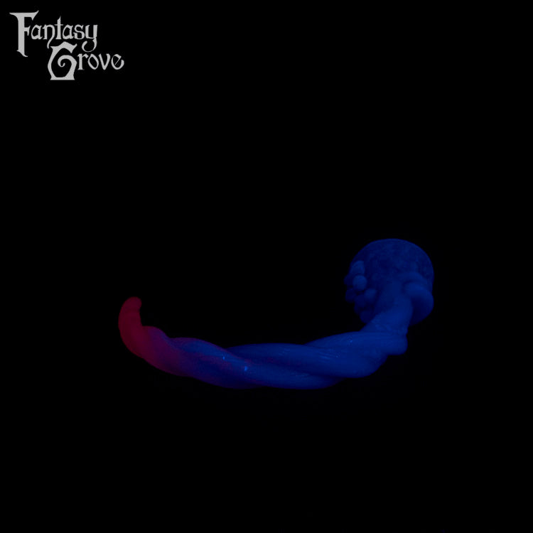 A fantasy sex toy on a black background with the Fantasy Grove logo in the upper left corner
