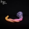 A fantasy sex toy on a black background with the Fantasy Grove logo in the upper left corner