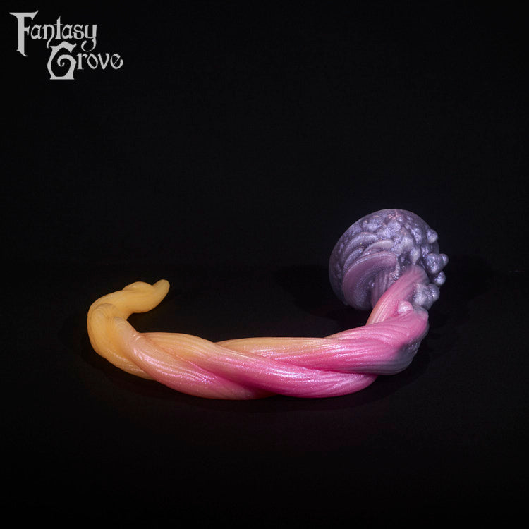 A fantasy sex toy on a black background with the Fantasy Grove logo in the upper left corner