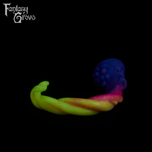 A fantasy sex toy on a black background with the Fantasy Grove logo in the upper left corner
