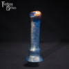 A fantasy sex toy on a black background with the Fantasy Grove logo in the upper left corner 