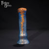 A fantasy sex toy on a black background with the Fantasy Grove logo in the upper left corner 