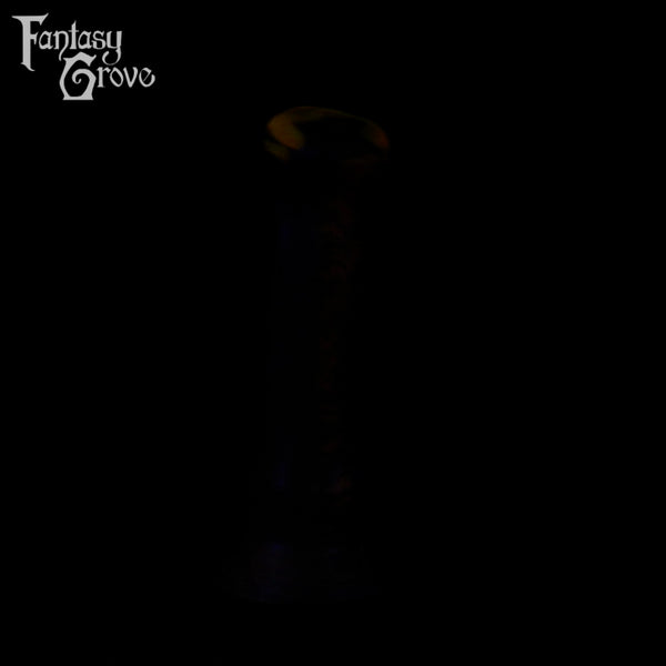 A fantasy sex toy on a black background with the Fantasy Grove logo in the upper left corner 