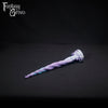 A fantasy sex toy on a black background with the Fantasy Grove logo in the upper left corner 