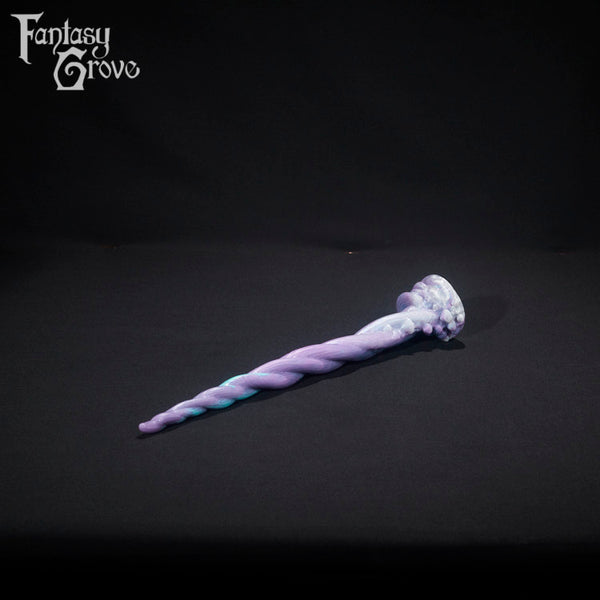A fantasy sex toy on a black background with the Fantasy Grove logo in the upper left corner 