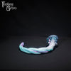 A fantasy sex toy on a black background with the Fantasy Grove logo in the upper left corner 