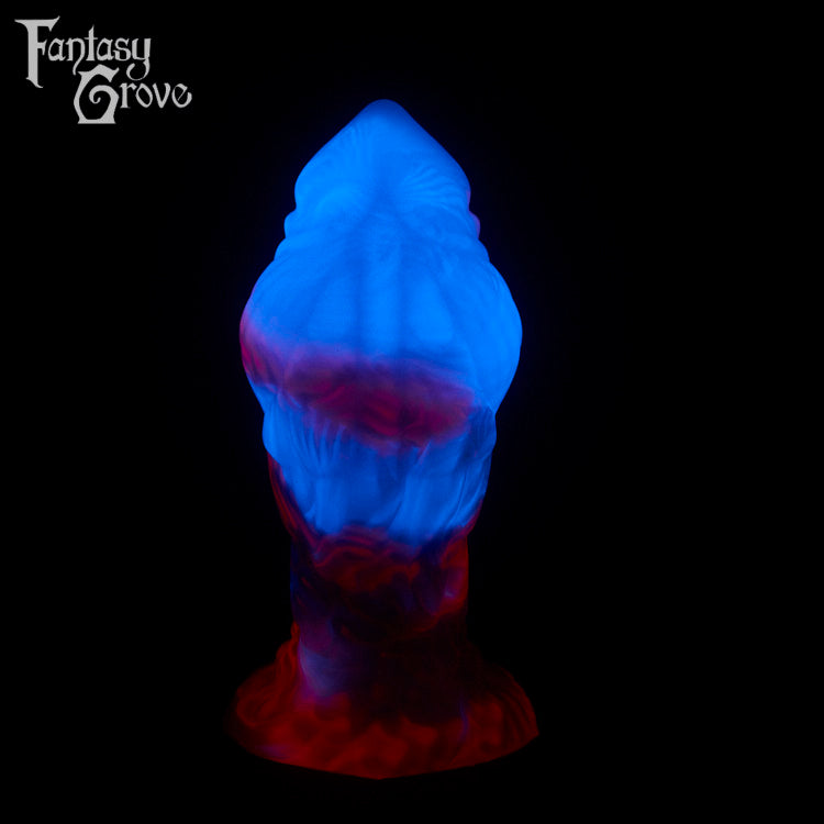 A fantasy sex toy on a black background with the Fantasy Grove logo in the upper left corner 